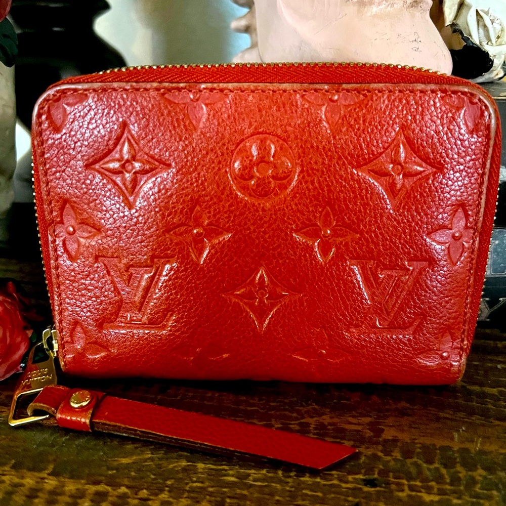 Louis Vuitton Empreinte Leather Secrete Wallet with dust bag, box and ribbon.